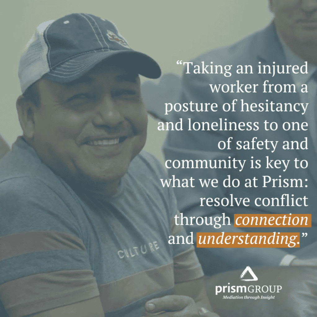 Smiling man in a cap and T-shirt sits with others; a quote about mediation services for resolving conflicts is overlaid.